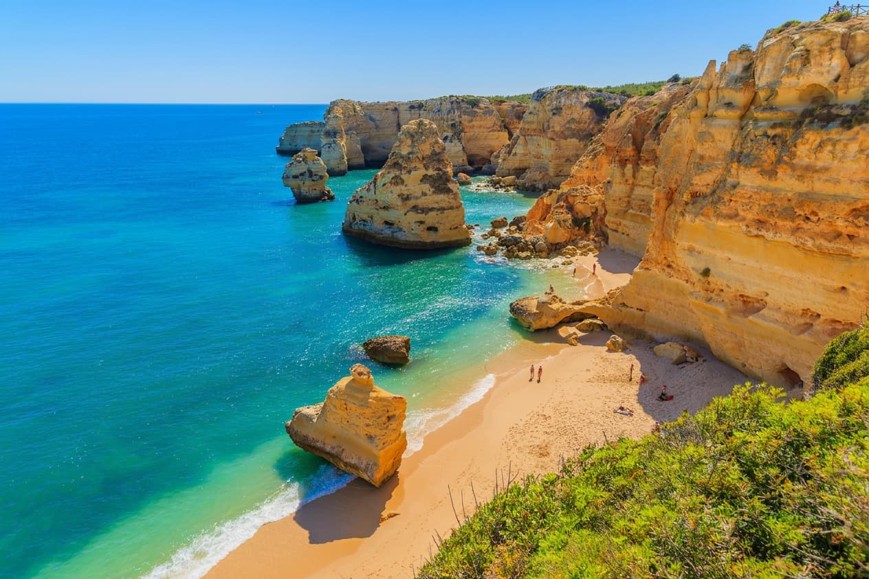 Cliffs and sandy beach along the Algarve coast in Portugal